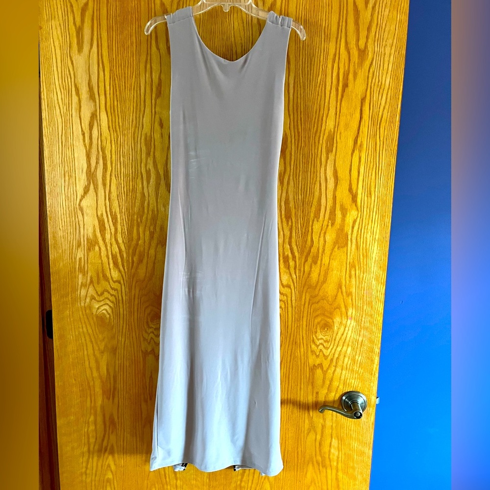 Beige very stretchy dance dress with open back.